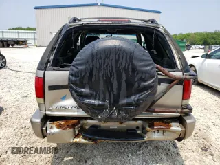 2000 Chevrolet Blazer LS z VIN 1GNCT18W3YK175871, wystawiony jako Copart lot #58230204 z przebiegiem Nie podano mil oraz Nie do naprawy • Non repairable. Historia ofert i sprzedaży dostępna na DreamBid. Obrazek 6.