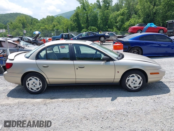 2001 Saturn SL z VIN 1G8ZK54721Z272773, wystawiony jako IAAI lot #42449133 z przebiegiem 56 714 mil mil oraz . Historia ofert i sprzedaży dostępna na DreamBid. Obrazek 13.