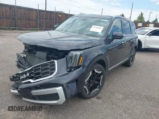 2025 Kia Telluride S with VIN 5XYP64GC0SG622891, listed as a IAAI auction lot 42781011 with 5,960 mi miles and . Bid and sale history available at DreamBid. Image 2.