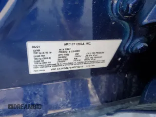 2021 Tesla Model Y Performance z VIN 5YJYGDEF8MF215815, wystawiony jako Copart lot #44752105 z przebiegiem 45 491 mil mil oraz Szkoda całkowita • Salvage title. Historia ofert i sprzedaży dostępna na DreamBid. Obrazek 13.