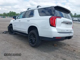 2023 GMC Yukon Denali with VIN 1GKS2DKT6PR245476, listed as a IAAI auction lot 42053782 with 51,598 mi miles. Bid and sale history available at carsss.com. Image 3.