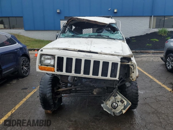 2001 Jeep Cherokee Sport with VIN 1J4FF48S41L611052, listed as a Copart auction lot 59667135 with 270,448 mi miles and Clean title. Bid and sale history available at DreamBid. Image 5.