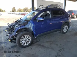 2022 Toyota Corolla Cross LE with VIN 7MUCAAAG6NV021103, listed as a Copart auction lot 56882015 with 21,769 mi miles and Salvage title. Bid and sale history available at DreamBid. Image 1.