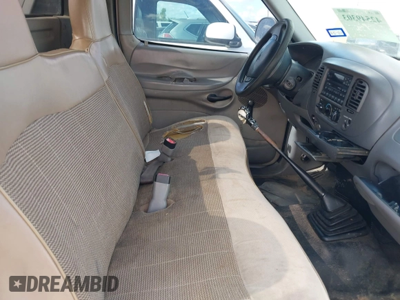 1998 Ford F-150 with VIN 1FTZF1729WKB83429, listed as a IAAI auction lot 42549303 with 173,426 mi miles and . Bid and sale history available at DreamBid. Image 5.