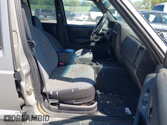 2001 Jeep Cherokee Sport with VIN 1J4FF48SX1L568532, listed as a IAAI auction lot 42738398 with 281,001 mi miles and . Bid and sale history available at DreamBid. Image 5.