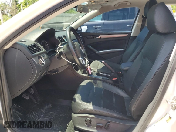 2015 Volkswagen Passat SE with VIN 1VWBV7A30FC065687, listed as a Copart auction lot 63218375 with 124,286 mi miles and Salvage title. Bid and sale history available at DreamBid. Image 7.