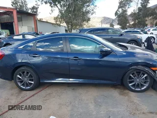 2020 Honda Civic EX-L with VIN 19XFC1F78LE019550, listed as a IAAI auction lot 41517951 with 27,788 mi miles and . Bid and sale history available at DreamBid. Image 13.