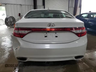 2013 Hyundai Azera z VIN KMHFG4JG7DA229084, wystawiony jako Copart lot #62580265 z przebiegiem 114 505 mil mil oraz Szkoda całkowita • Salvage title. Historia ofert i sprzedaży dostępna na DreamBid. Obrazek 6.