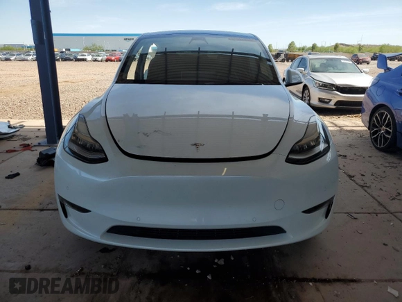 2022 Tesla Model Y Long Range z VIN 7SAYGDEE5NA015841, wystawiony jako Copart lot #57842275 z przebiegiem 51 952 mil mil oraz Szkody całkowita. Historia ofert i sprzedaży dostępna na DreamBid. Obrazek 5.