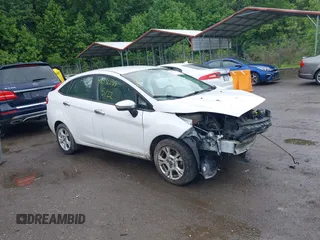 2016 Ford Fiesta SE z VIN 3FADP4BJ5GM173195, wystawiony jako IAAI lot #42332299 z przebiegiem 91 758 mil mil oraz . Historia ofert i sprzedaży dostępna na DreamBid. Obrazek 1.