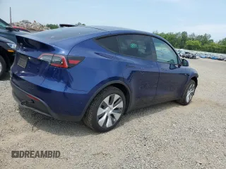 2024 Tesla Model Y Long Range z VIN 7SAYGDEE8RA248635, wystawiony jako Copart lot #59130125 z przebiegiem 21 210 mil mil oraz Szkoda całkowita • Salvage title. Historia ofert i sprzedaży dostępna na DreamBid. Obrazek 3.