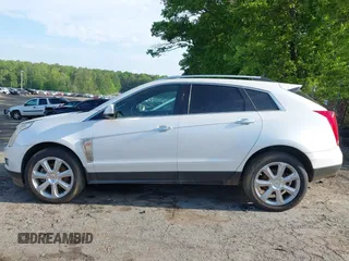 2014 Cadillac SRX Performance Collection with VIN 3GYFNCE36ES662689, listed as a IAAI auction lot 42109417 with 132,957 mi miles. Bid and sale history available at carsss.com. Image 14.