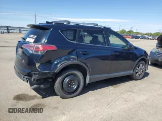 2017 Toyota RAV4 LE with VIN JTMBFREVXHJ700923, listed as a Copart auction lot 52887645 with 119,528 mi miles and Salvage title. Bid and sale history available at DreamBid. Image 3.