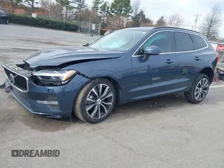 2022 Volvo XC60 Momentum z VIN YV4L12RK0N1059848, wystawiony jako IAAI lot #41714245 z przebiegiem 31 404 mil mil oraz . Historia ofert i sprzedaży dostępna na DreamBid. Obrazek 16.