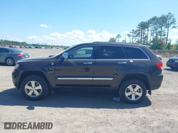 2011 Jeep Grand Cherokee Overland with VIN 1J4RR6GT1BC647292, listed as a IAAI auction lot 42069742 with 199,340 mi miles and . Bid and sale history available at DreamBid. Image 14.
