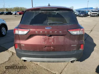 2021 Ford Escape SE with VIN 1FMCU9G67MUA94906, listed as a Copart auction lot 54310725 with 84,595 mi miles and Salvage title. Bid and sale history available at DreamBid. Image 6.
