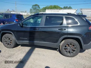 2016 Jeep Cherokee Latitude with VIN 1C4PJMCB2GW236835, listed as a IAAI auction lot 42698119 with 111,985 mi miles and . Bid and sale history available at DreamBid. Image 14.
