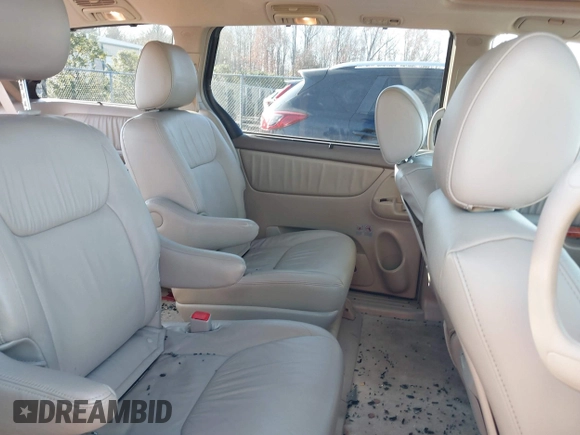 2010 Toyota Sienna XLE with VIN 5TDYK4CC6AS320562, listed as a IAAI auction lot 41005929 with 105,082 mi miles and . Bid and sale history available at DreamBid. Image 8.