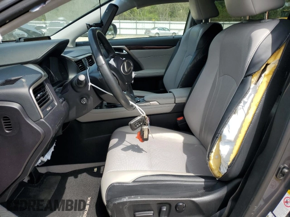 2018 Lexus RX 350 z VIN 2T2BZMCA2JC163021, wystawiony jako Copart lot #52337205 z przebiegiem 61 057 mil mil oraz Szkoda całkowita • Salvage title. Historia ofert i sprzedaży dostępna na DreamBid. Obrazek 7.