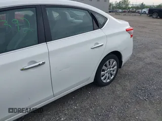 2015 Nissan Sentra S with VIN 3N1AB7AP0FY375472, listed as a IAAI auction lot 42211392 with 207,510 mi miles. Bid and sale history available at carsss.com. Image 13.