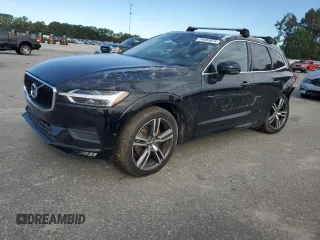 2019 Volvo XC60 Momentum z VIN LYVA22RKXKB302111, wystawiony jako Copart lot #74493074 z przebiegiem 56 143 mil mil oraz Szkoda całkowita • Salvage title. Historia ofert i sprzedaży dostępna na DreamBid. Obrazek 1.
