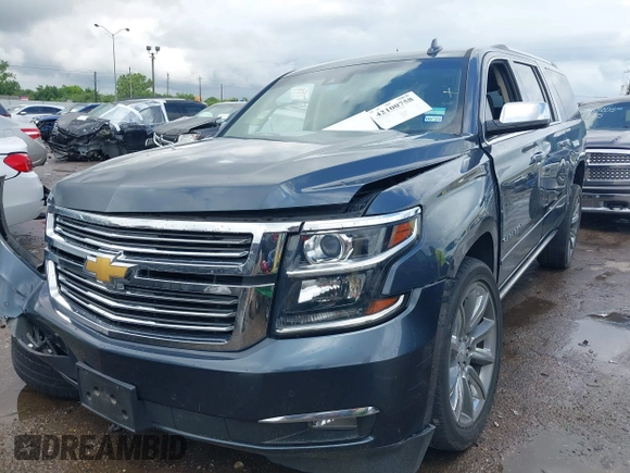 2019 Chevrolet Suburban Premier z VIN 1GNSCJKC0KR139323, wystawiony jako IAAI lot #42100758 z przebiegiem Nie podano mil oraz . Historia ofert i sprzedaży dostępna na DreamBid. Obrazek 17.