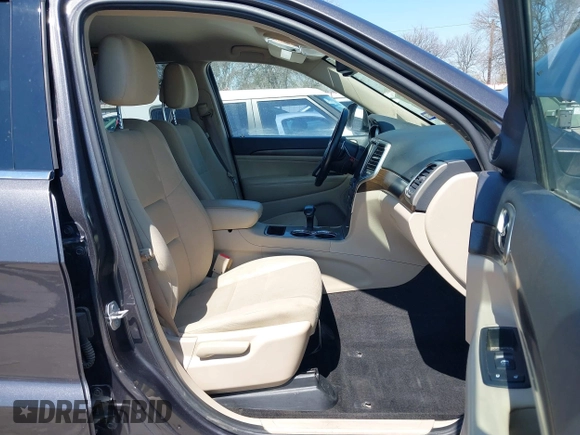 2015 Jeep Grand Cherokee Altitude with VIN 1C4RJEAG0FC952260, listed as a IAAI auction lot 41738692 with 124,197 mi miles. Bid and sale history available at carsss.com. Image 5.