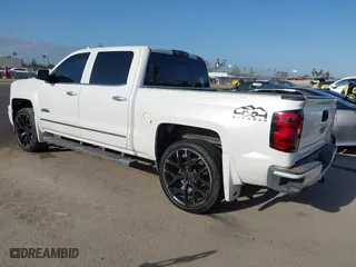 2015 Chevrolet Silverado 1500 High Country with VIN 3GCUKTEC6FG204564, listed as a IAAI auction lot 41953511 with 130,341 mi miles. Bid and sale history available at carsss.com. Image 3.