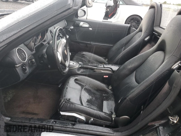 2005 Porsche Boxster z VIN WP0CA298X5U712515, wystawiony jako Copart lot #74030354 z przebiegiem Nie podano mil oraz Szkoda całkowita • Salvage title. Historia ofert i sprzedaży dostępna na DreamBid. Obrazek 7.