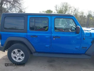 2021 Jeep Wrangler Unlimited Sport S z VIN 1C4HJXDG4MW743151, wystawiony jako IAAI lot #42204776 z przebiegiem 42 363 mil mil oraz . Historia ofert i sprzedaży dostępna na DreamBid. Obrazek 13.