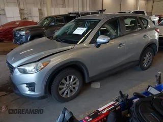 2016 Mazda CX-5 Sport with VIN JM3KE2BE5G0720507, listed as a IAAI auction lot 41872003 with 160,727 mi miles and . Bid and sale history available at carsss.com. Image 17.