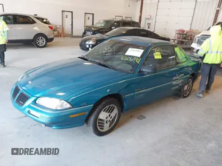 1994 Pontiac Grand Am z VIN 1G2NE15M5RM500643, wystawiony jako IAAI lot #42069901 z przebiegiem 77 129 mil mil oraz . Historia ofert i sprzedaży dostępna na DreamBid. Obrazek 17.