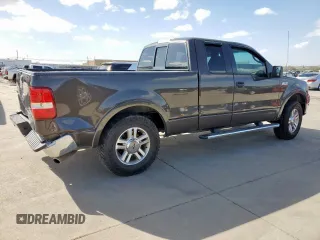 2005 Ford F-150 XLT with VIN 1FTPX12575NB60735, listed as a Copart auction lot 49598075 with 153,360 mi miles and Salvage title. Bid and sale history available at DreamBid. Image 3.