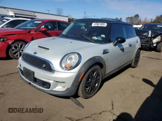 2012 MINI Hardtop S with VIN WMWSV3C53CT386724, listed as a Copart auction lot 47061005 with 119,581 mi miles and Salvage Title. Bid and sale history available at DreamBid. Image 1.