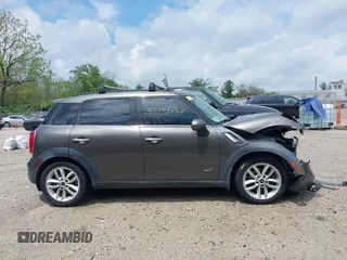 2013 MINI Countryman S ALL4 with VIN WMWZC5C58DWP30600, listed as a IAAI auction lot 42203285 with 76,796 mi miles and . Bid and sale history available at DreamBid. Image 14.
