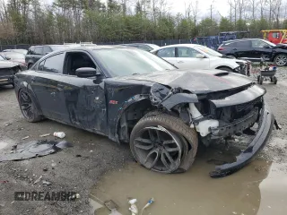 2021 Dodge Charger Scat Pack Widebody with VIN 2C3CDXGJ3MH620792, listed as a Copart auction lot 48355595 with 72,379 mi miles and Salvage Title. Bid and sale history available at carsss.com. Image 4.