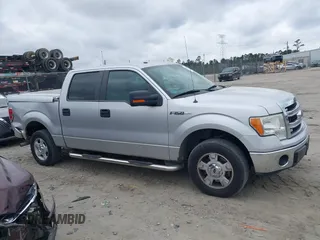 2014 Ford F-150 XL with VIN 1FTFW1CF9EFA40824, listed as a IAAI auction lot 41843053 with 124,613 mi miles. Bid and sale history available at carsss.com. Image 13.