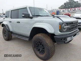2024 Ford Bronco Raptor with VIN 1FMEE0RRXRLB33753, listed as a IAAI auction lot 42465984 with 1,702 mi miles and . Bid and sale history available at DreamBid. Image 1.