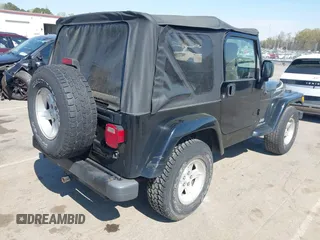 2005 Jeep Wrangler X with VIN 1J4FA39S35P372731, listed as a IAAI auction lot 41875121 with 146,034 mi miles and . Bid and sale history available at DreamBid. Image 4.