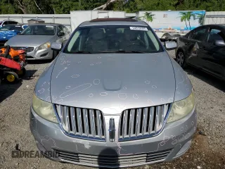 2009 Lincoln MKS with VIN 1LNHM93R29G604655, listed as a Copart auction lot 54019505 with 170,607 mi miles and Salvage Title. Bid and sale history available at DreamBid. Image 5.