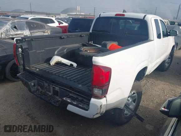 2019 Toyota Tacoma SR with VIN 5TFSX5EN0KX066774, listed as a IAAI auction lot 41534797 with 153,172 mi miles and . Bid and sale history available at DreamBid. Image 4.