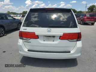 2010 Honda Odyssey LX with VIN 5FNRL3H23AB032112, listed as a Copart auction lot 60876035 with 223,335 mi miles and Salvage title. Bid and sale history available at DreamBid. Image 6.