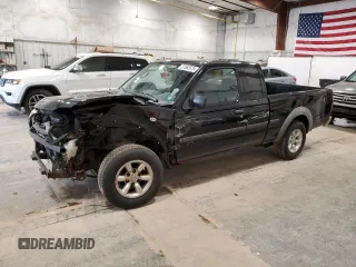 2002 Nissan Frontier z VIN 1N6DD26S52C310573, wystawiony jako Copart lot #57562675 z przebiegiem 205 987 mil mil oraz Nie do naprawy • Non repairable. Historia ofert i sprzedaży dostępna na DreamBid. Obrazek 1.