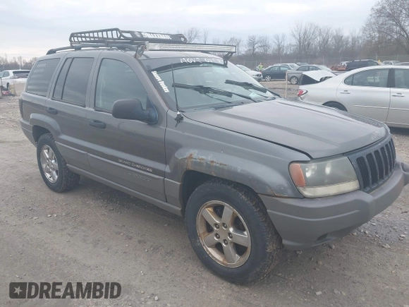 2002 Jeep Grand Cherokee Laredo with VIN 1J4GW48S92C294116, listed as a IAAI auction lot 42080375 with 154,108 mi miles and . Bid and sale history available at DreamBid. Image 1.