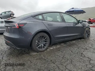 2025 Tesla Model 3 Long Range z VIN 5YJ3E1EA5SF900225, wystawiony jako Copart lot #48584355 z przebiegiem 4 869 mil mil oraz Szkoda całkowita • Salvage title. Historia ofert i sprzedaży dostępna na DreamBid. Obrazek 3.