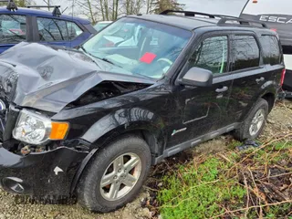 2011 Ford Escape Hybrid z VIN 1FMCU5K36BKB54964, wystawiony jako Copart lot #82873554 z przebiegiem Nie podano mil oraz Szkoda całkowita • Salvage title. Historia ofert i sprzedaży dostępna na DreamBid. Obrazek 1.