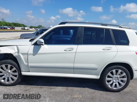2012 Mercedes-Benz GLK GLK 350 with VIN WDCGG5GB8CF735979, listed as a IAAI auction lot 41931333 with 124,649 mi miles. Bid and sale history available at carsss.com. Image 14.