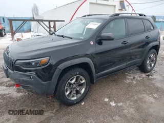 2019 Jeep Cherokee Trailhawk Elite with VIN 1C4PJMBX6KD313675, listed as a IAAI auction lot 41448924 with 51,639 mi miles. Bid and sale history available at carsss.com. Image 17.