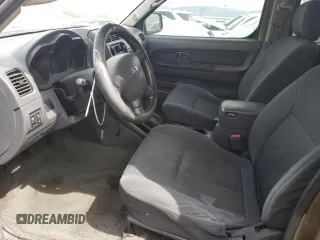 2002 Nissan Frontier XE z VIN 1N6ED29X92C367175, wystawiony jako Copart lot #54979685 z przebiegiem 281 470 mil mil oraz Szkoda całkowita • Salvage title. Historia ofert i sprzedaży dostępna na DreamBid. Obrazek 7.