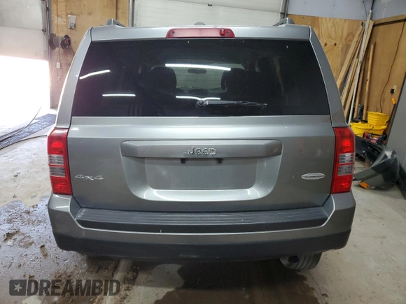 2014 Jeep Patriot Latitude with VIN 1C4NJRFBXED546921, listed as a Copart auction lot 61032895 with 133,344 mi miles and Clean title. Bid and sale history available at DreamBid. Image 6.